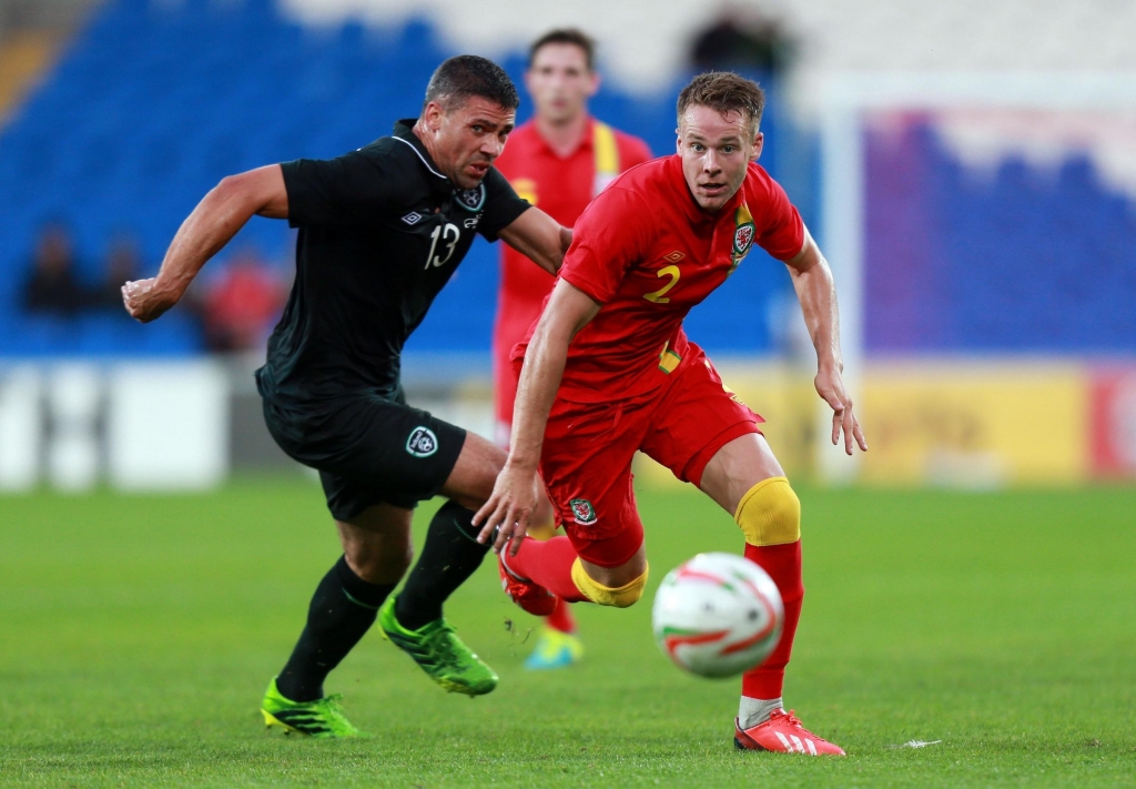 Wales Chris Gunter under pressure from Republic of Ireland's Jonathan Walters during the International Friendly at Cardiff City Stadium Cardiff. PRESS ASSOCIATION