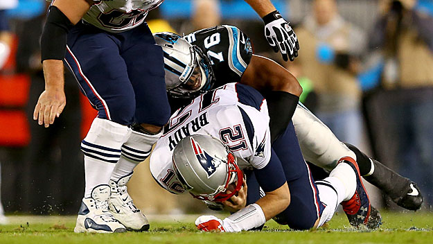 Greg Hardy sacks Patriots quarterback Tom Brady while with the Carolina Panthers during the 2013 NFL season