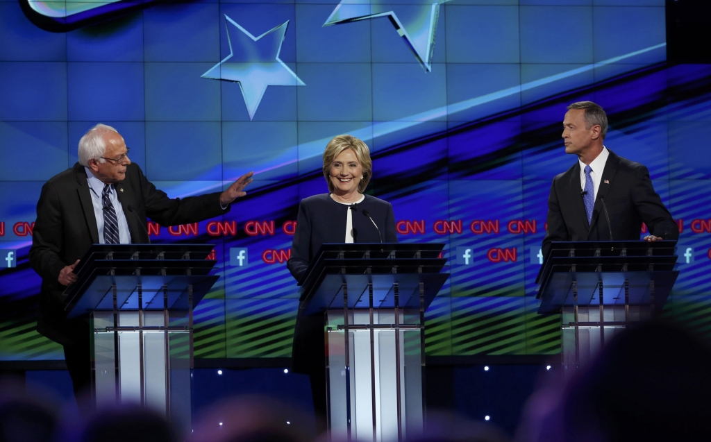 Democratic presidential candidates Sanders Clinton and O'Malley debate during the first official Democratic candidates debate of the 2016 presidential campaign in Las Vegas