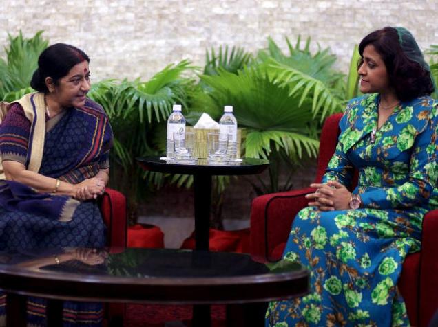 India's Foreign Minister Sushma Swaraj talks with Maldivian Foreign Minister Dunya Maumoon during a meeting in Male Maldives