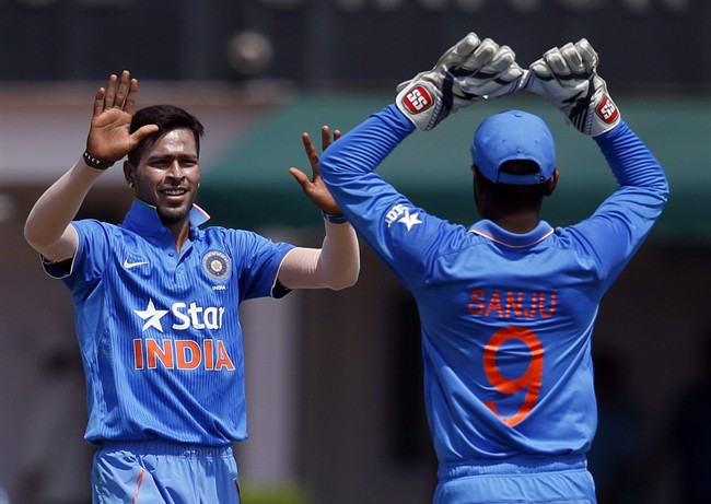 India A player Hardik Patel left celebrates after taking wicket of South Africa's David Miller during a practice match in New Delhi India Tuesday Sept. 29 2015. South Africa will play three Twenty20 five one-day internationals and four test matches