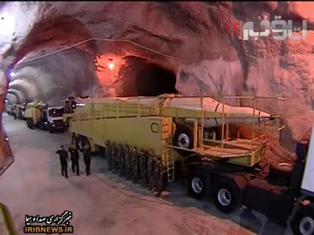 Iran’s Revolutionary Guard opened the doors of a secret underground missile base to state TV showing off medium and long-range missiles