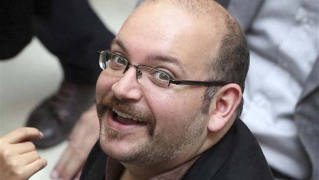 Ali Rezaian brother of imprisoned Washington Post journalist Jason Rezaian wipes his brow as he talks about the recent announcement of a verdict in his brother's case by Iran's judiciary during an interview with Reuters in Washingt