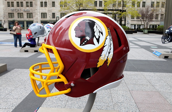 Washington Redskins NFL football helmet is on display in Pioneer Court to commemorate the NFL Draft 2015 in Chicago