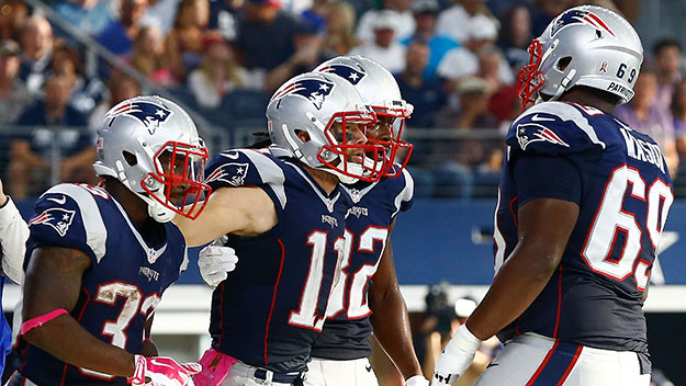 Julian Edelman celebrates with Dion Lewis Keshawn Martin and Shaq Mason after scoring against the Dallas Cowboys