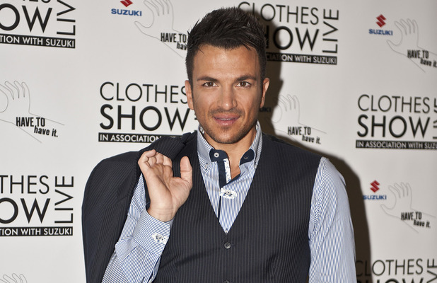 Peter Andre posing for press on the opening day of The Clothes Shows Live 2012