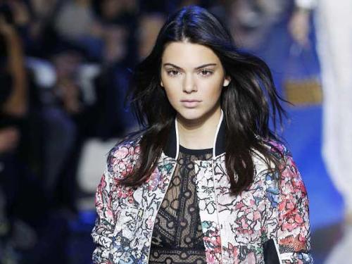 Models not celebrity guests turn heads in Paris