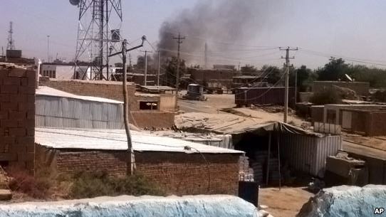 Smoke rises from a police station during clashes between Taliban fighters and Afghan security forces in Kunduz city north of Kabul Afghanistan Monday Sept. 28 2015