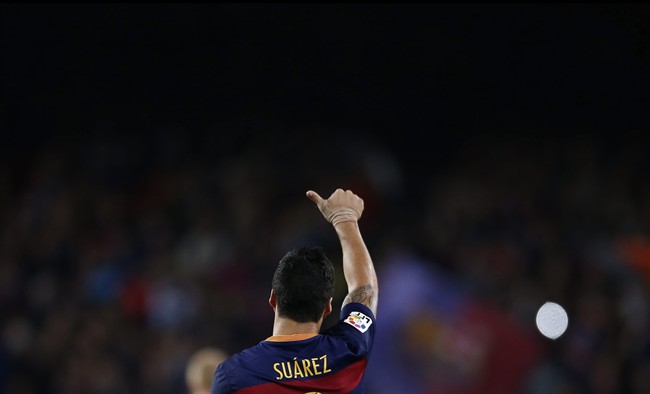 FC Barcelona's Luis Suarez celebrates after scoring against Eibar during a Spanish La Liga soccer match at the Camp Nou stadium in Barcelona Spain Sunday Oct. 25 2015