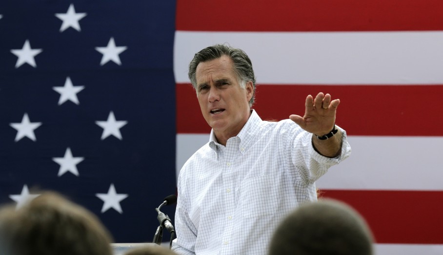 Mitt Romney the former Republican presidential nominee addresses a crowd of supporters while introducing New Hampshire Senate candidate Scott Brown at a farm in Stratham N.H. Romney told a small group of Republi