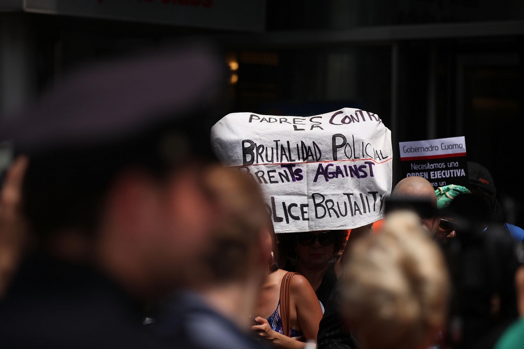 Activists hold a demonstration against police brutality in front of Gov. Andrew Cuomo's office