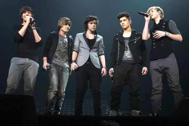 One Direction on stage when they first started to make the big time