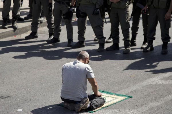 Palestinian in 'press' vest shot dead after stabbing soldier