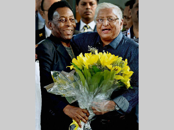 Pele being welcomed with a floral bouquet by former Indian footballer Chuni Goswami at a city hotel in Kolkata on Sunday