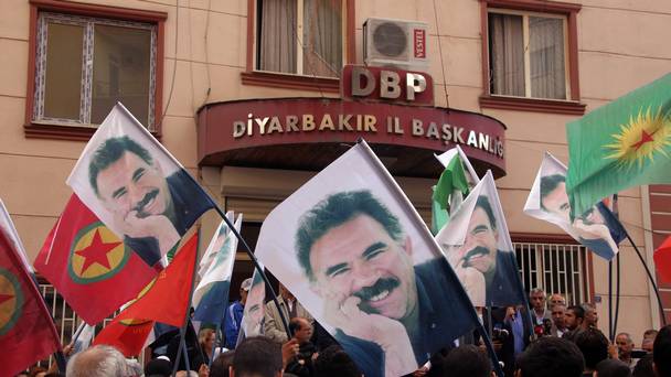 People hold posters of jailed PKK leader Abdullah Ocalan