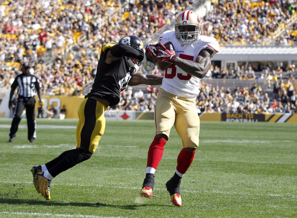 PITTSBURGH PA- SEPTEMBER 20 Vernon Davis #85 of the San Francisco 49ers makes a catch against Antwon Blake #41 of the Pittsburgh Steelers during the game