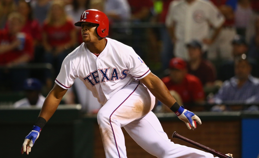 ARLINGTON TX- OCTOBER 01 Adrian Beltre #29 of the Texas Rangers hits a three-run double against the Los Angeles Angels in the fifth inning at Globe Life Park in Arlington