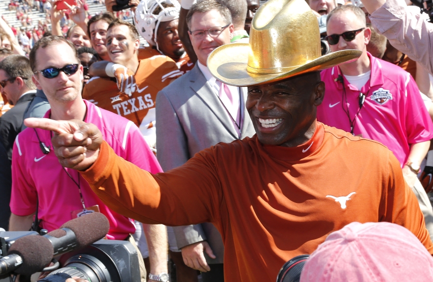 Two of UT's embattled figures- coach Charlie Strong left and quarterback Tyrone Swoopes- enjoy a triumphant day in which Swoopes contributed touchdowns running and passing in spot duty