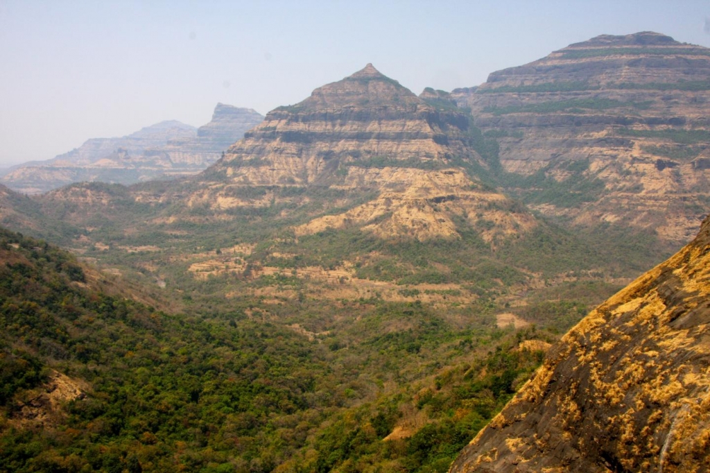 These are layered lava flows of the Deccan Traps east of Mumbai India