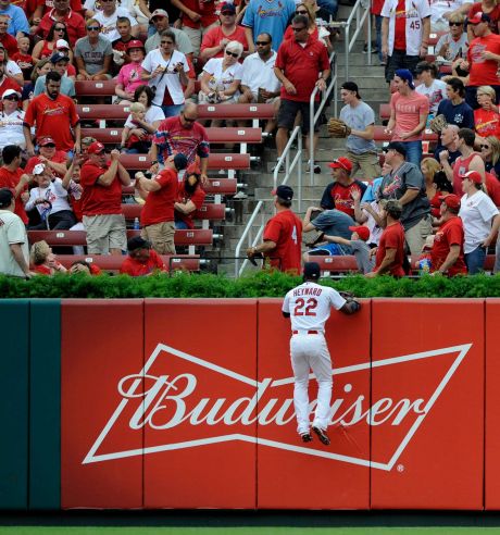 St. Louis Cardinals Jason Heyward watches a solo home run ball hit by Milwaukee Brewers Khris Davis in the second inning of a baseball game Sunday Sep. 27 2015 at Busch Stadium in St. Louis