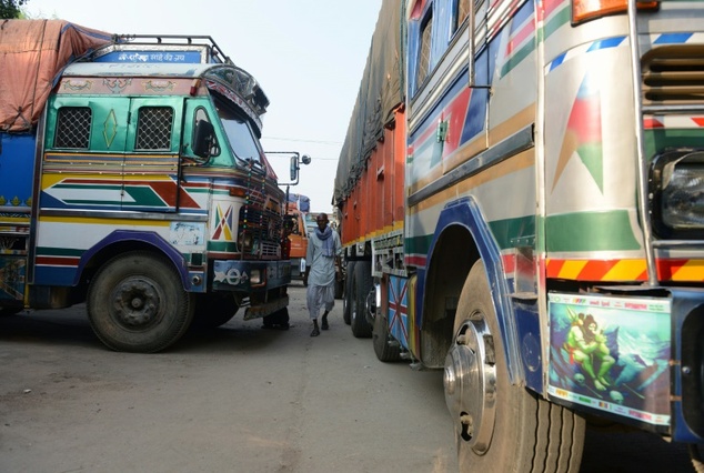 Scores of trucks have been stranded at a key India Nepal border checkpoint for almost two weeks