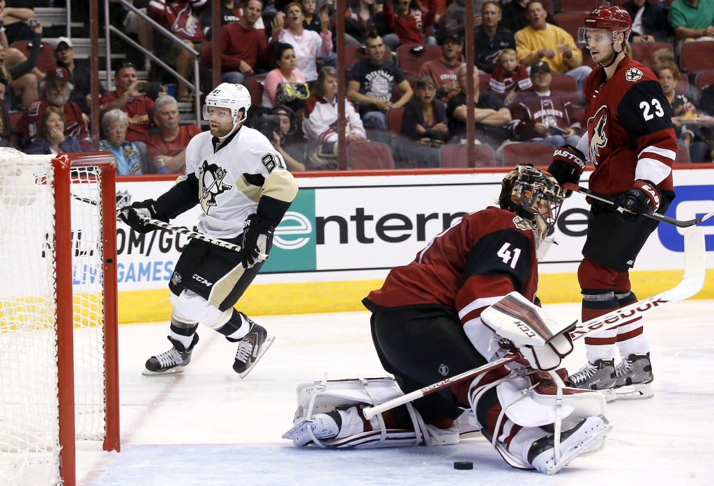 Phil Kessel skates past Coyotes goalie Mike Smith Phil Kessel skates past Coyotes goalie Mike Smith after scoring a goal as Coyotes&#39 Oliver Ekman-Larsson right watches during the second period of play in Glendale Ariz