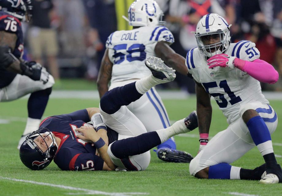 Houston Texans Ryan Mallett reacts after a late hit from Indianapolis Colts Sio Moore during the first half of an NFL football game Thursday Oct. 8 2015 in Houston. Mallett left the game after the play