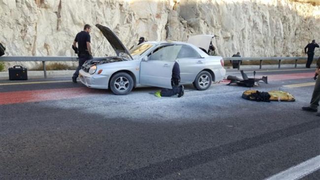 Israeli police is seen at the site of an explosion near the West Bank city of Ma'ale Adumim just east of East al Quds