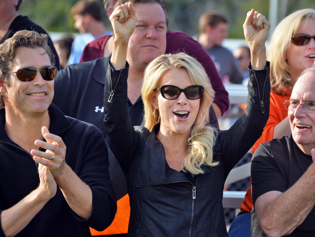 BCS class of ’88 grad Megyn Kelly of Fox News cheers a touchdown by her team before a halftime Hall of Fame induction ceremony at Bethlehem Central High School Saturday Sept. 26 2015 in Bethlehem NY