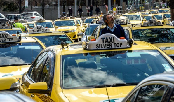 Taxi drivers protest against Uber at Parliament