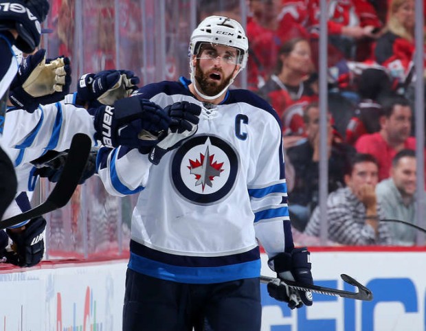 Team captain Andrew Ladd celebrates power play