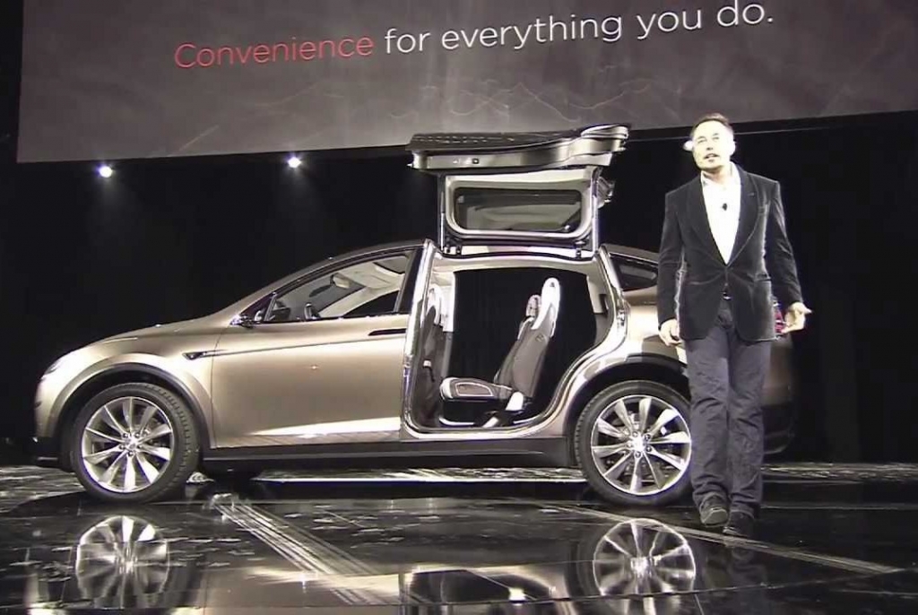 Tesla Model X electric SUV has Falcowing doors that are hinged to a high-strength center-spine on the roof