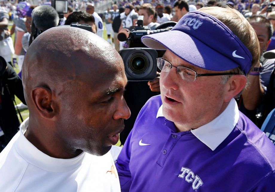 Texas head coach Charlie Strong left meets with TCU head coach Gary Patterson right after TCU defeated Texas 50-7 in an NCAA football game Saturday Oct. 3 2015 in Fort Worth Texas