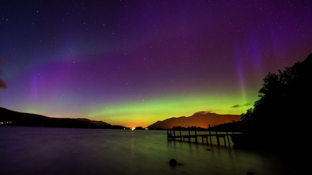 The Aurora Borealis as seen over Derwentwater near Keswick in England on Thursday