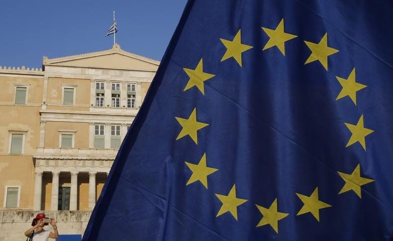 The European Union flag is seen in front of the parliament building during a Pro Euro rally in Athens Greece