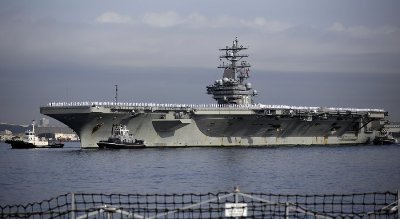 The nuclear-powered aircraft carrier will replace the previously deployed USS George Washington