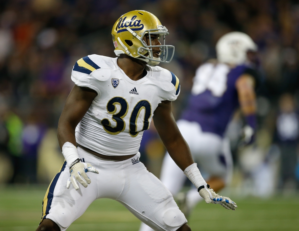 SEATTLE WA- NOVEMBER 08 Linebacker Myles Jack #30 of the UCLA Bruins defends against the Washington Huskies