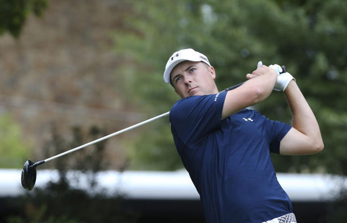 Jordan Spieth tees off on the fourth hole in the final round of the Tour Championship golf tournament at East Lake Golf Club Sunday Sept. 27 2015 in Atlanta. — AP