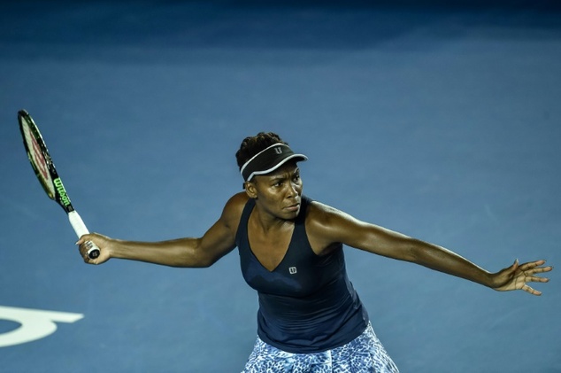 US tennis player Venus Williams eyes the ball before returning to Wang Yafan of China during the second round of the WTA Hong Kong Open in Hong Kong on Octob