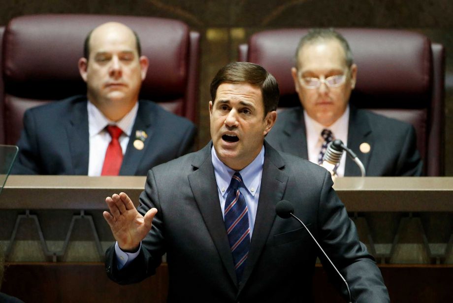 Arizona Republican Gov. Doug Ducey front gives his state-of-the-state address as at the Arizona Capitol in Phoenix. Ducey was almost immediately criticized for tweeting'We got him! just five minutes