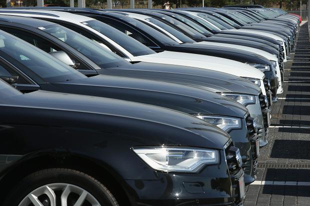 Audi cars stand at an Audi dealership