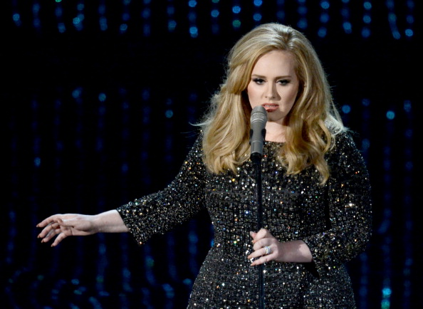 HOLLYWOOD CA FEBRUARY 24 Singer Adele performs onstage during the Oscars held at the Dolby Theatre