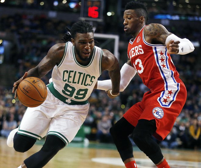 Boston Celtics Jae Crowder drives past Philadelphia 76ers Robert Covington during the first quarter of an NBA basketball game in Boston Wednesday Nov. 25 2015