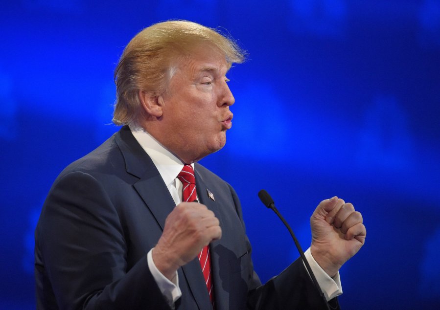 Credit Mark J. Terrill           Donald Trump makes a point during the third GOP debate