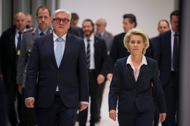 German Defence Minister Ursula von der Leyen and German Foreign Minister Frank Walter Steinmeier arrive for a press conference