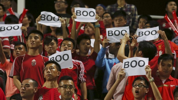 Hong Kong soccer fans boo the Chinese national anthem during the 2018 World Cup Asian qualifying match against China in Hong Kong