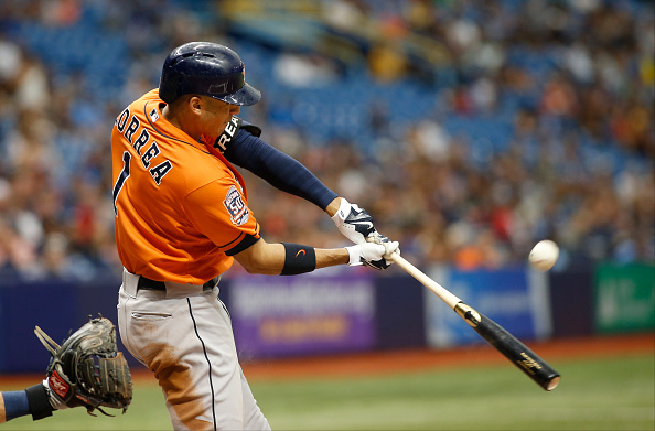 ST. PETERSBURG FL- JULY 12 Carlos Correa #1 of the Houston Astros flies out to right field during the fifth inning of a game against the Tampa Bay Rays