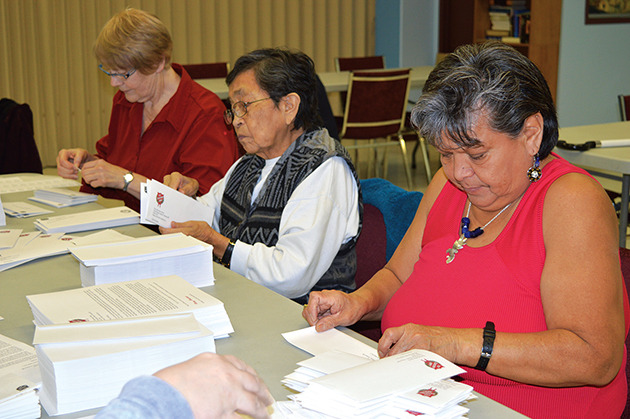 Arlene Ruttan Rhoda Seymour and Rhoda Puglas stuff envelopes for the Salvation Army letters which reach out to the community for donations for Christmas hampers.- Jackie Lieuwen