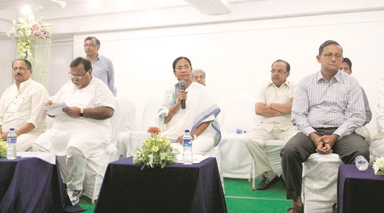 Mamata Banerjee along with state ministers at a administrative meeting at Town Hall on Friday