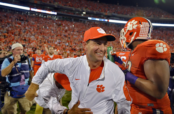 Clemson head coach Dabo Swinney celebrates after their 23-17 win over Florida State in an NCAA college football game Saturday Nov. 7 2015 in Clemson S.C